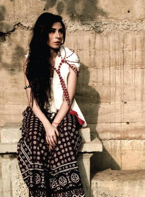Designer Feeha Jamshed models the Sindoor Dori along with an outfit by Inaaya in a fashion shoot